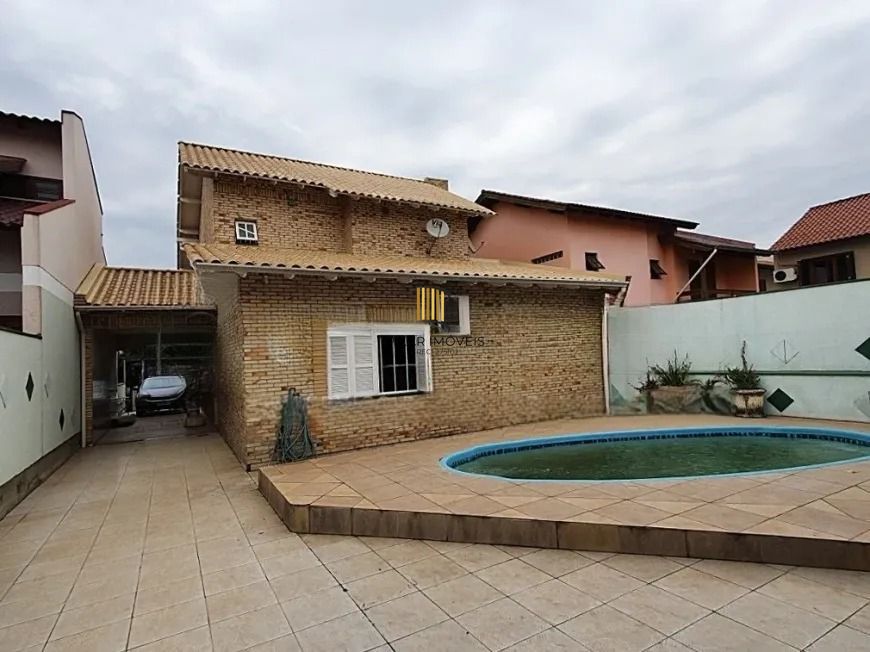 Sobrado com 3 suítes, pátio com piscina e salão de festas - Pilar Imóveis