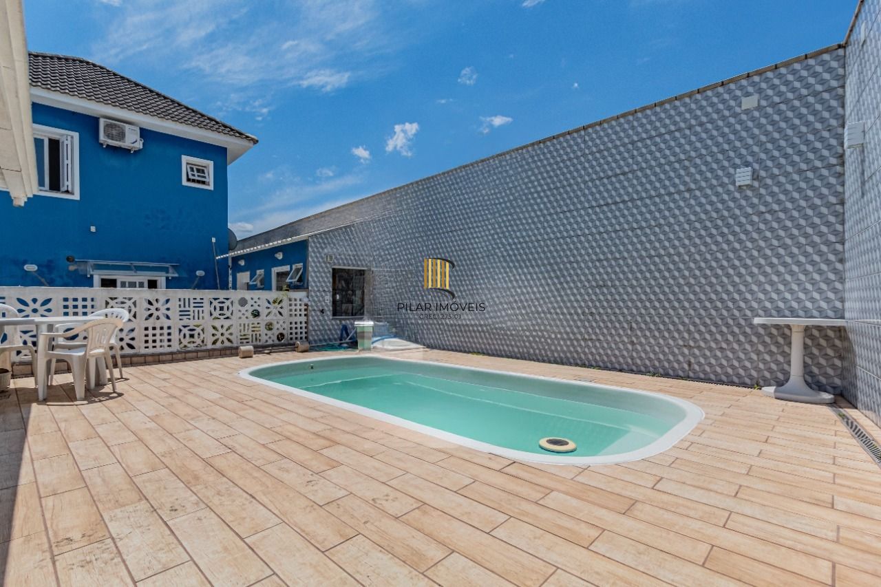 Casa 3 dormitórios no bairro Vila Carlos Antônio Wilkens