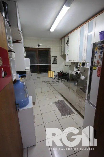 Casa residencial com 3 dormitórios 90m² privativos, e 2 vagas à venda no bairro Parque Santa Fé em Porto Alegre