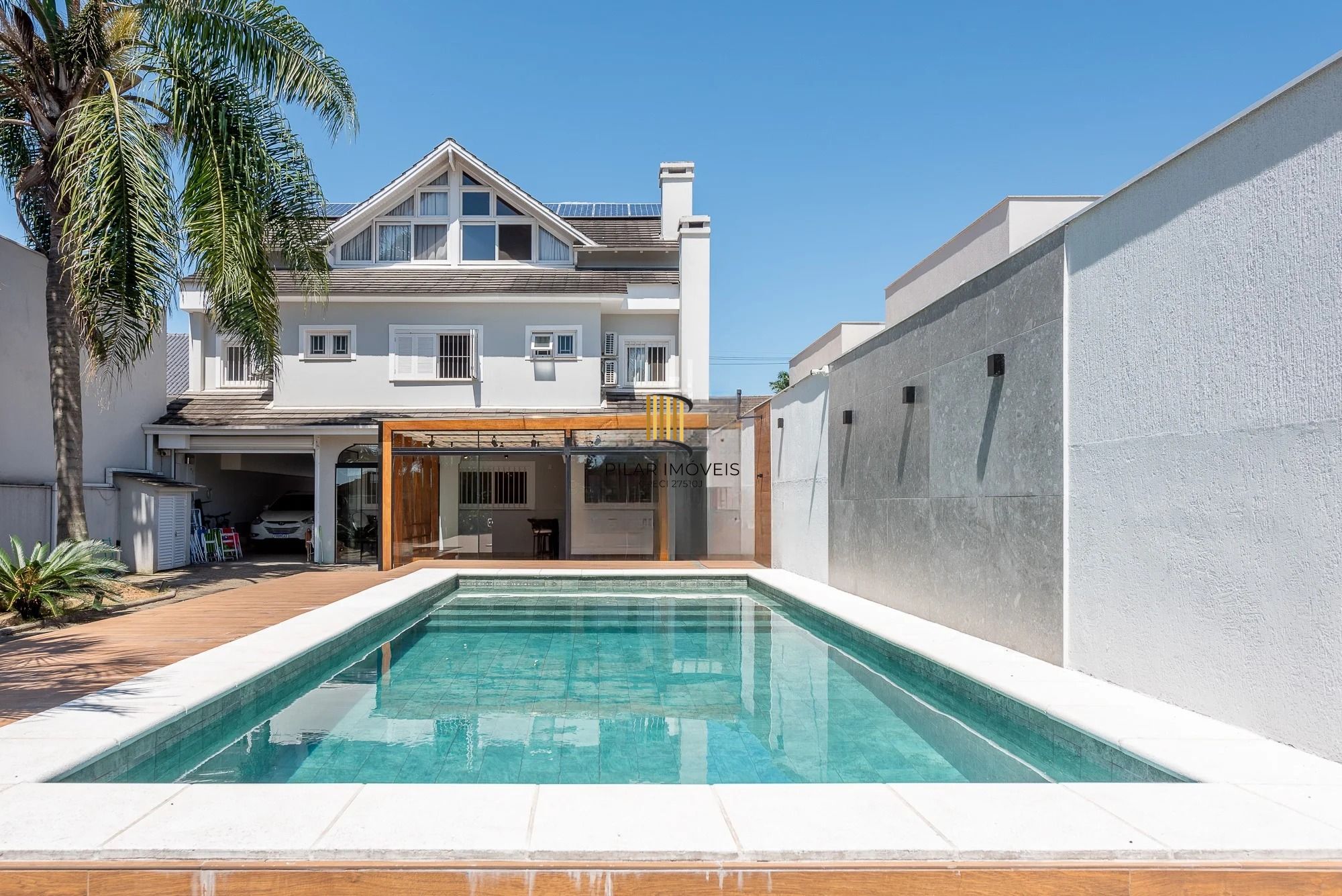 Casa alto padrão com 473m², piscina e 3 suítes no Ecoville – POA - Pilar Imóveis