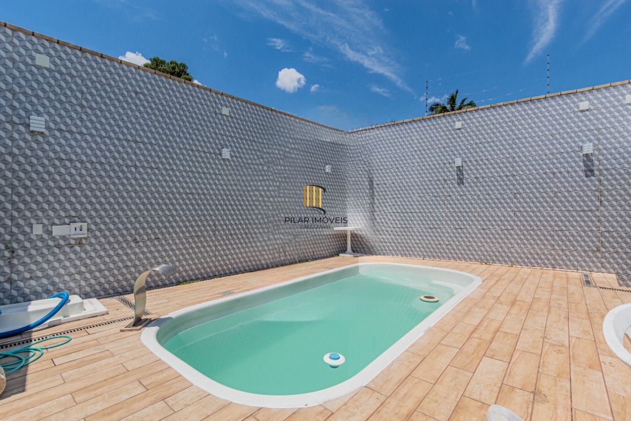 Casa 3 dormitórios no bairro Vila Carlos Antônio Wilkens