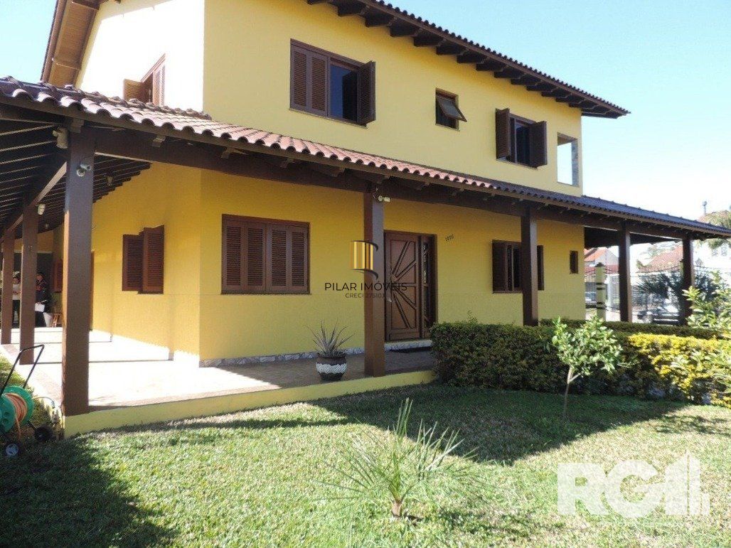 Casa 4 dormitórios no bairro Parque Santa Fé