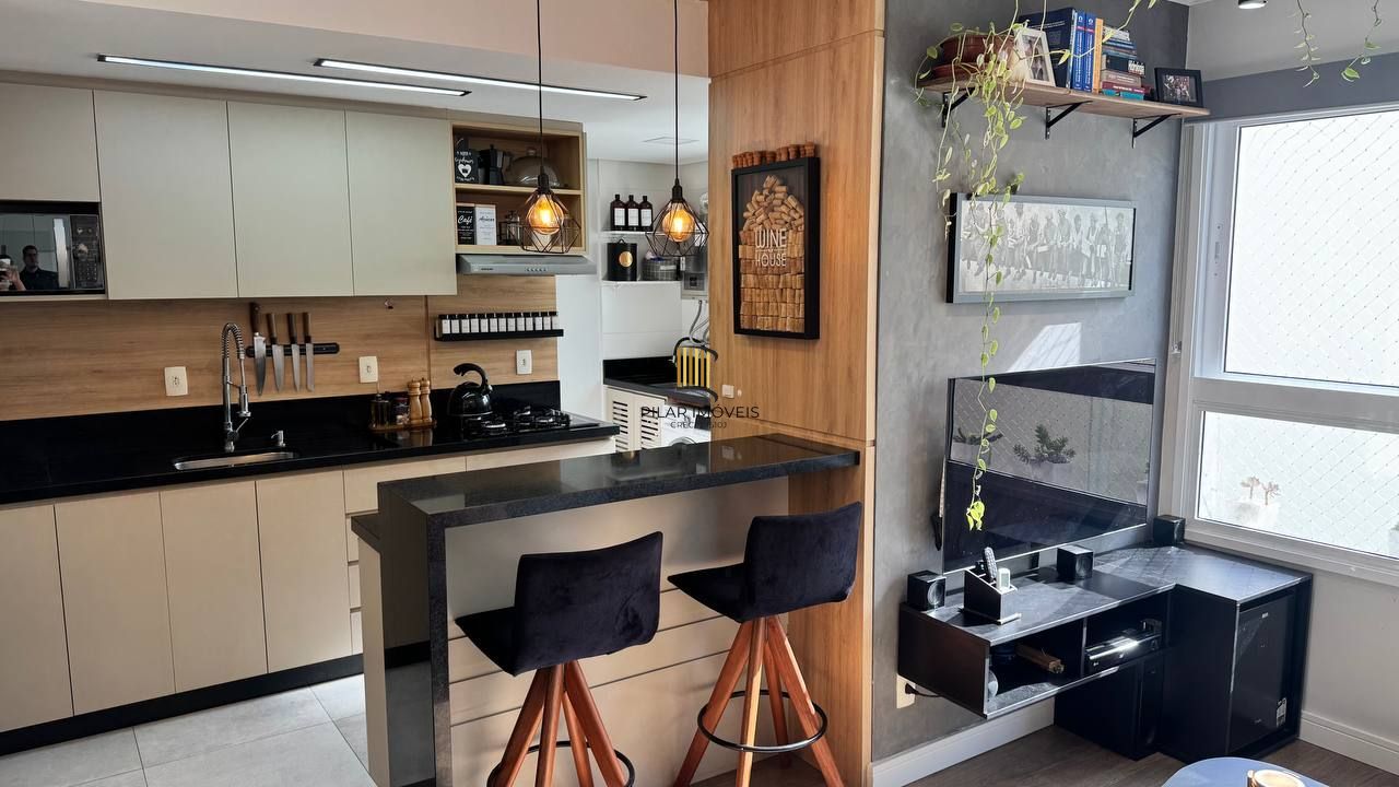 Apartamento mobiliado com 2 dormitórios 1 suíte e 1 vaga no Cristo Redentor
