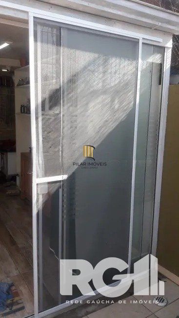 Casa residencial com 3 dormitórios 90m² privativos, e 2 vagas à venda no bairro Parque Santa Fé em Porto Alegre