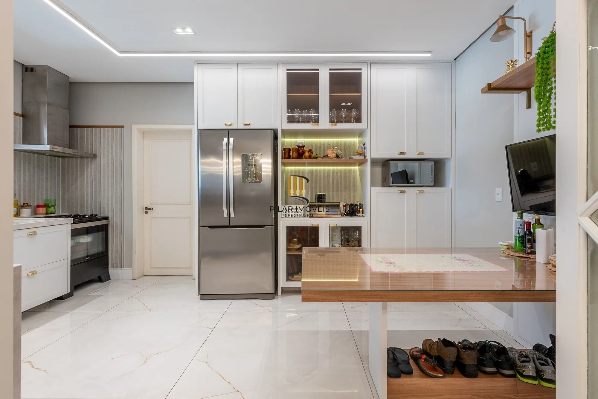 Casa alto padrão com 473m², piscina e 3 suítes no Ecoville – POA