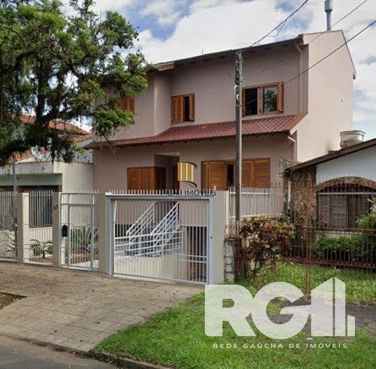 Casa 4 dormitórios no bairro Jardim Sabará - Pilar Imóveis