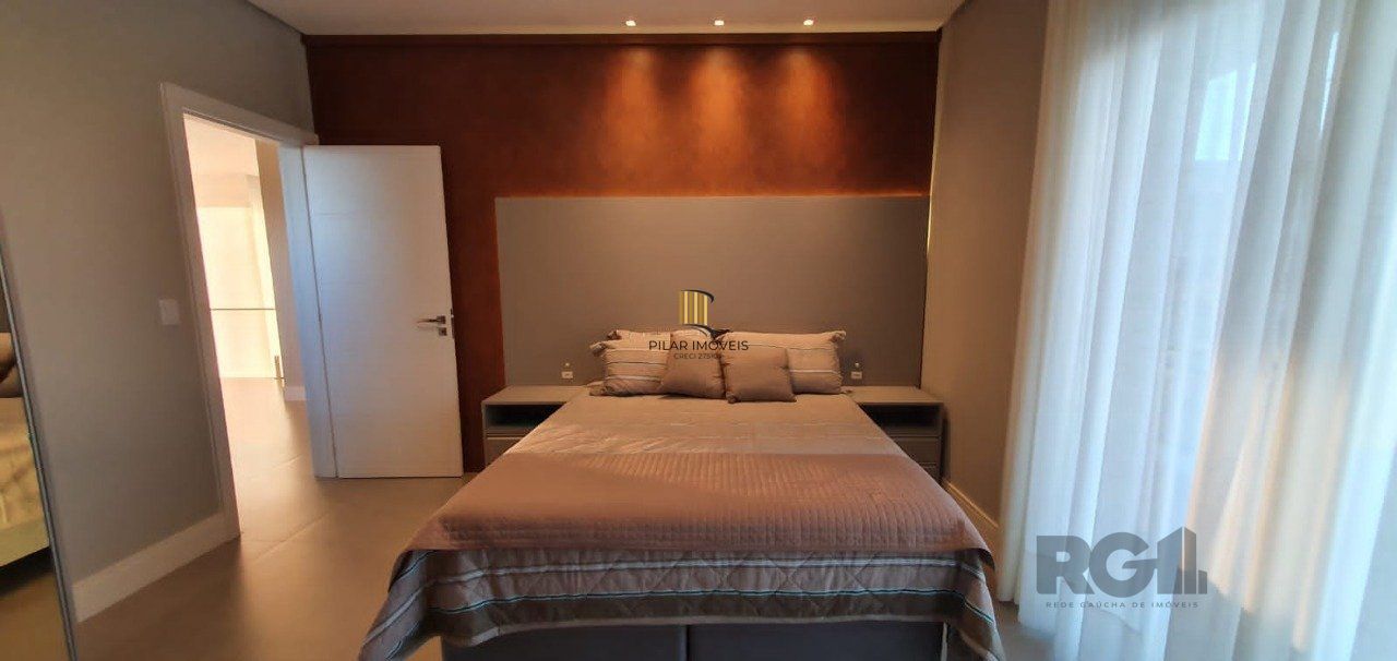 Casa em condomínio fechado de luxo a beira-mar, no centro de Capão da Canoa/RS.