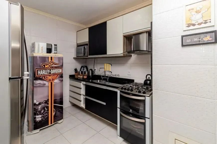 Casa com 214m², localizado no bairro Vila Jardim em Porto Alegre/RS.