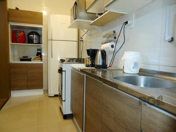 Apartamento com 1 dormitório localizado no bairro Auxiliadora em Porto Alegre/RS.