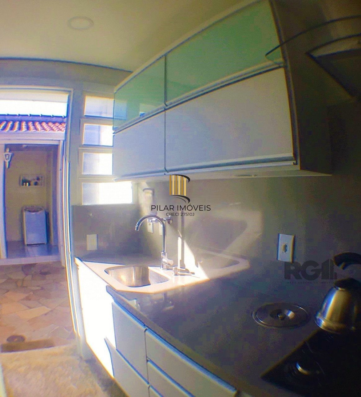 Casa com 3 dormitórios, localizada no bairro Jardim Itu em Porto Alegre/RS. 