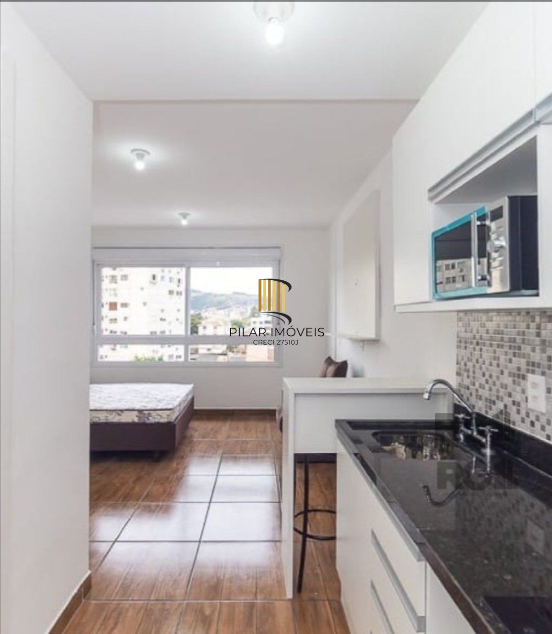 Loft com 27m², localizado ao lado da  PUCRS