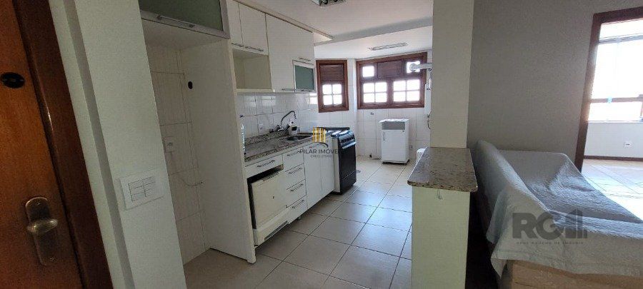 Apartamento de 2 dormitórios grande com suite, sacada fechada com churrasqueira, elevador, garagem, no Bairro São João / Higienópolis