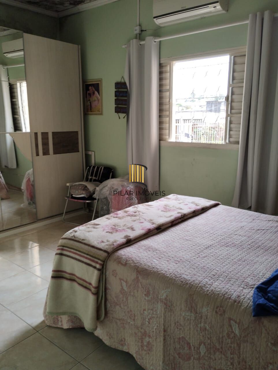 Terreno com duas frentes, três casas  (duas c/dois dormitórios e a outra tipo tipo JK)