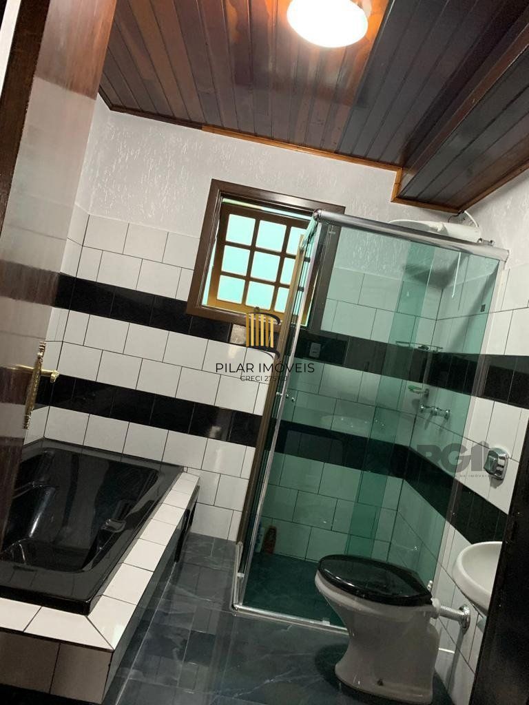 Casa sobrado com 03 dormitórios e garagem para 3 carros na cidade de Nova Petrópolis