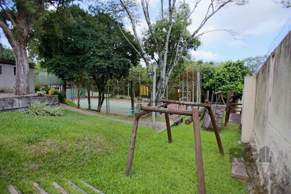Casa de Condomínio 3 dormitórios no bairro Cristal
