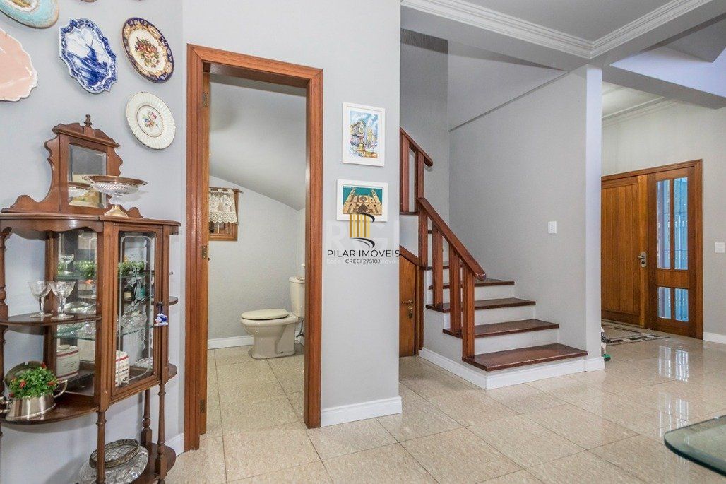 Casa 4 dormitórios no bairro Glória