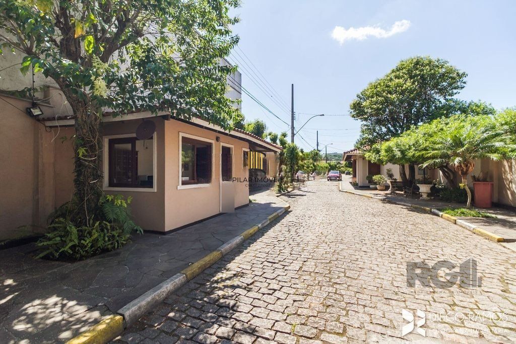 Casa de Condomínio 3 dormitórios no bairro Cavalhada