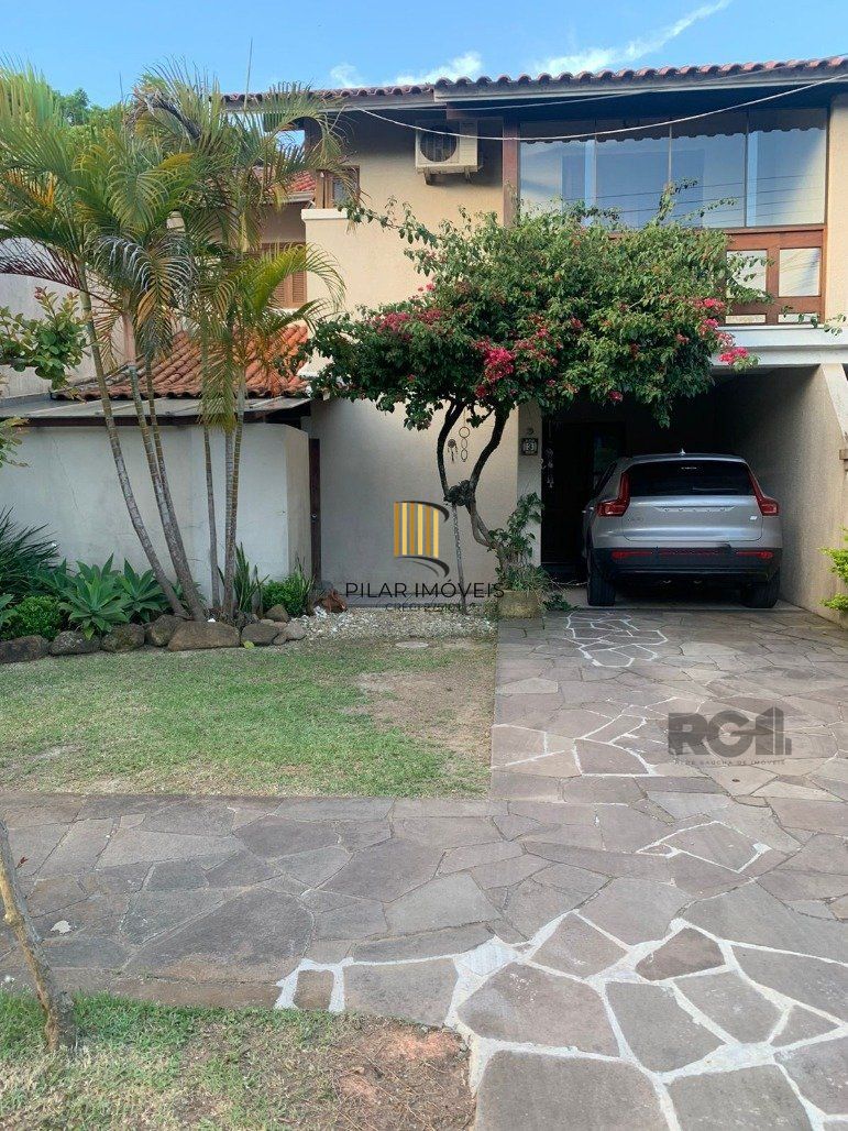 Casa de Condomínio 3 dormitórios no bairro Cavalhada