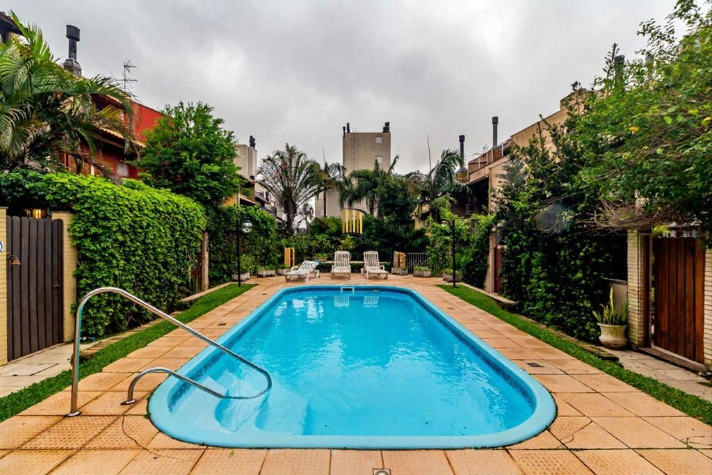 O Lar Ideal na Tristeza: Casa em Condomínio com 3 Dormitórios