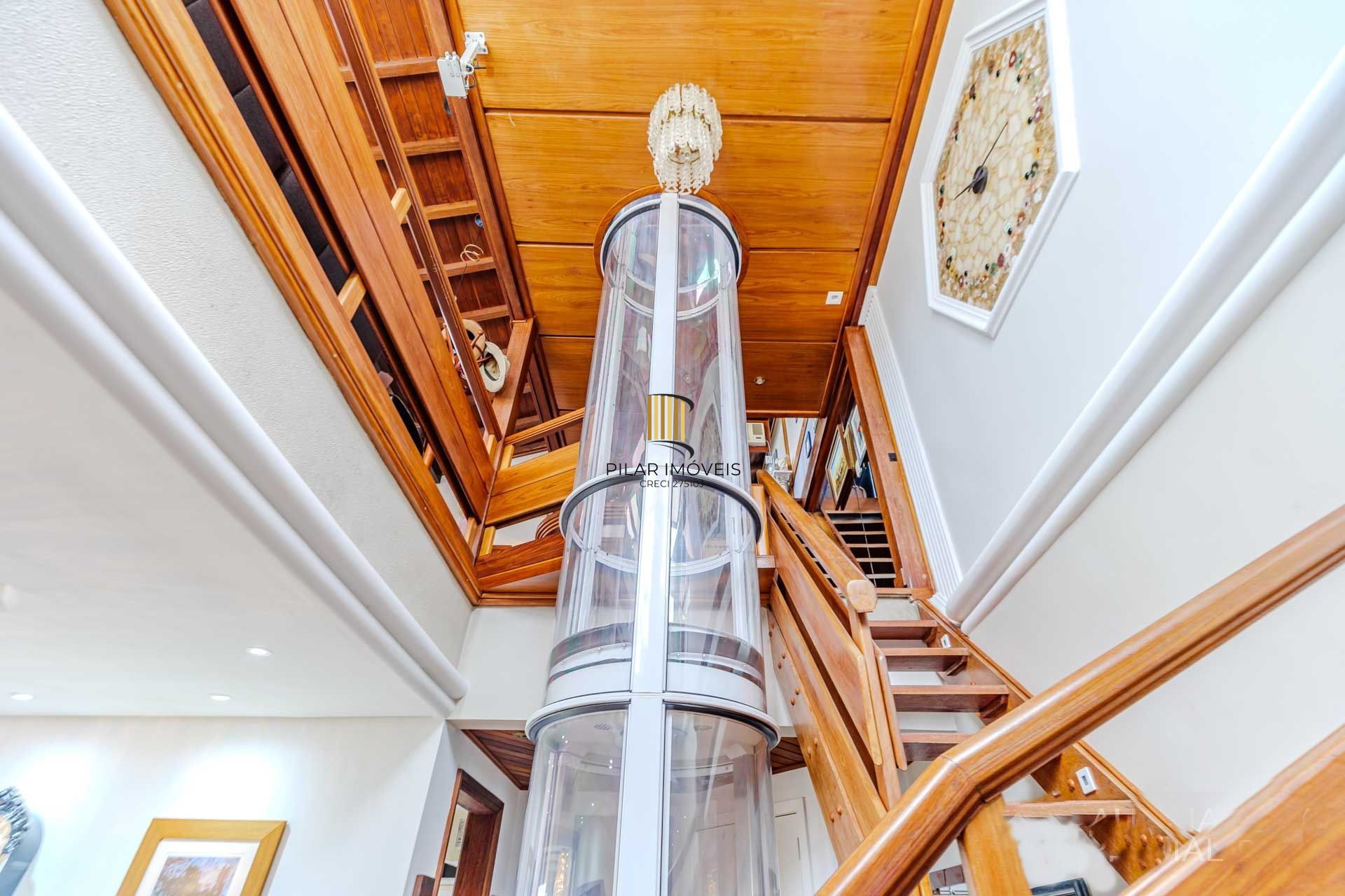 3 pavimentos com elevador eletronico e 2 vagas cobertas