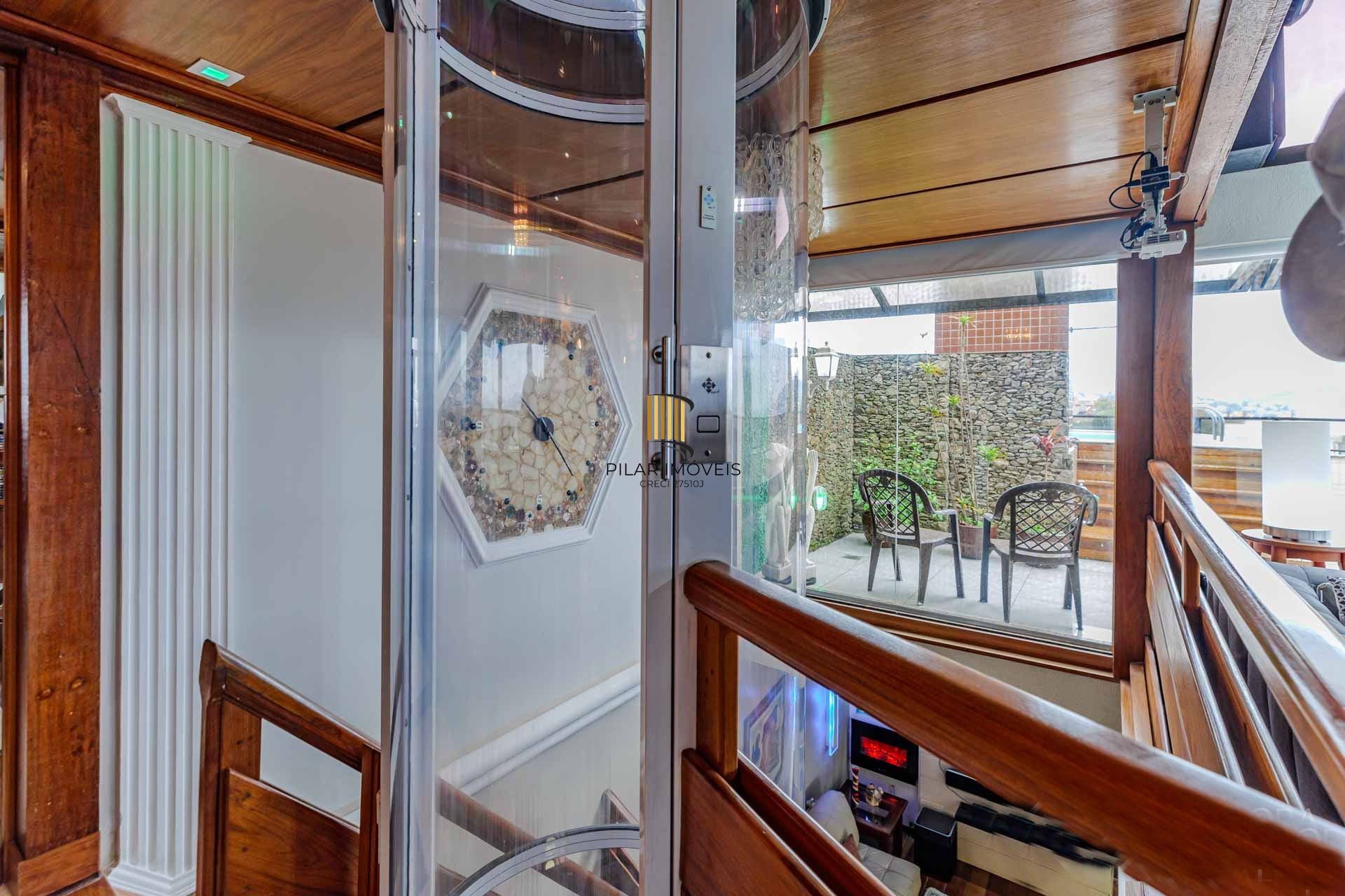 3 pavimentos com elevador eletronico e 2 vagas cobertas