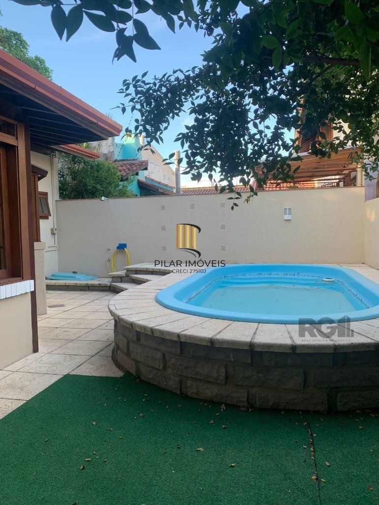 Casa de Condomínio 3 dormitórios no bairro Cavalhada