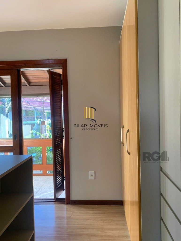 Casa de Condomínio 3 dormitórios no bairro Cavalhada
