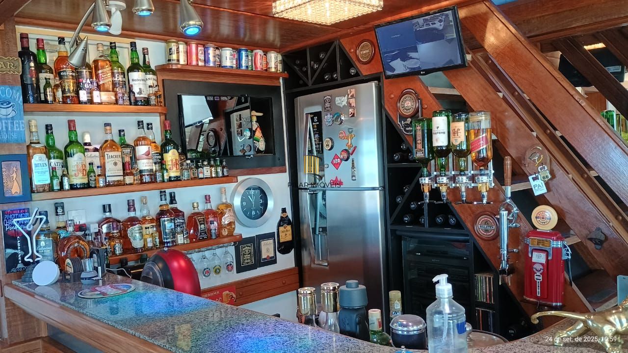 3 pavimentos com elevador eletronico e 2 vagas cobertas