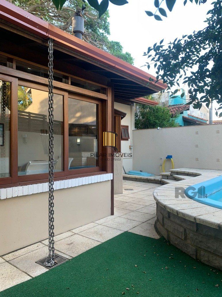 Casa de Condomínio 3 dormitórios no bairro Cavalhada