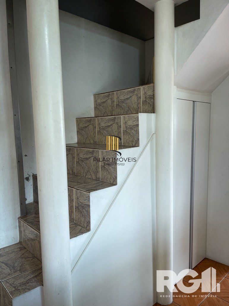 Casa 4 dormitórios no bairro Santo Antônio