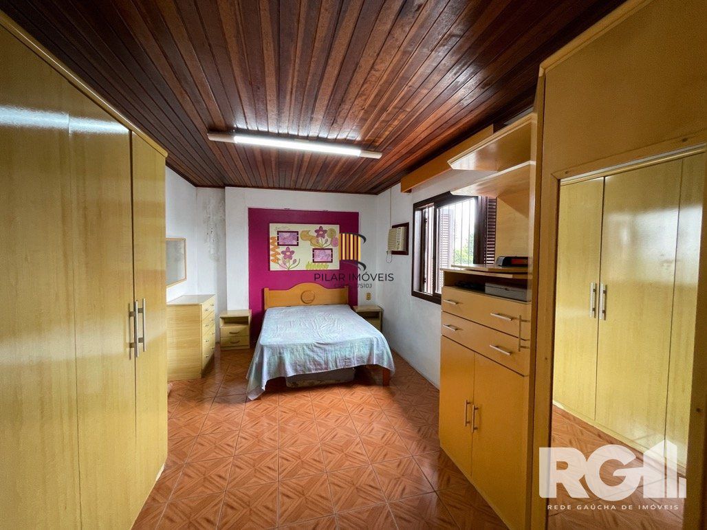 Casa 4 dormitórios no bairro Santo Antônio