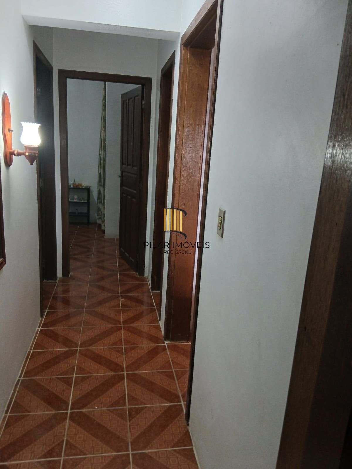 CASA A VENDA,  3 QUARTOS, PRÉDIO  COM DOIS PISOS NO BALNEARIO QUINTÃO EM PALMARES DO SUL.
