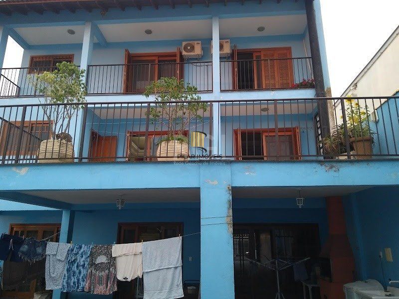 Casa 5 dormitórios no bairro Centro