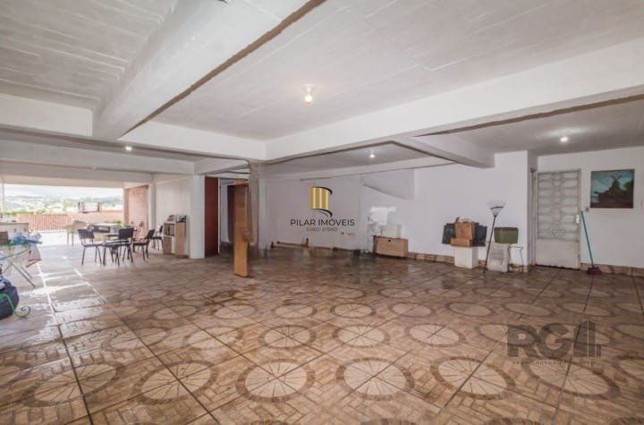 Casa 4 dormitórios no bairro Santo Antônio
