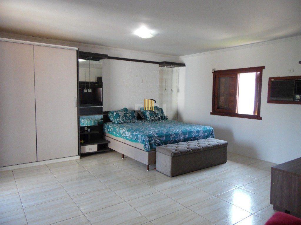 Casa para Venda - 410m², 5 dormitórios, sendo 5 suites, 5 vagas - Centro