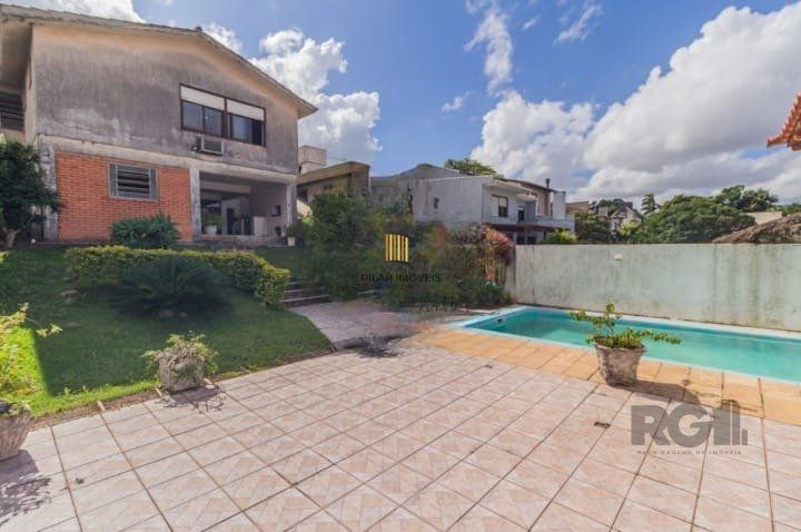 Casa 4 dormitórios no bairro Santo Antônio
