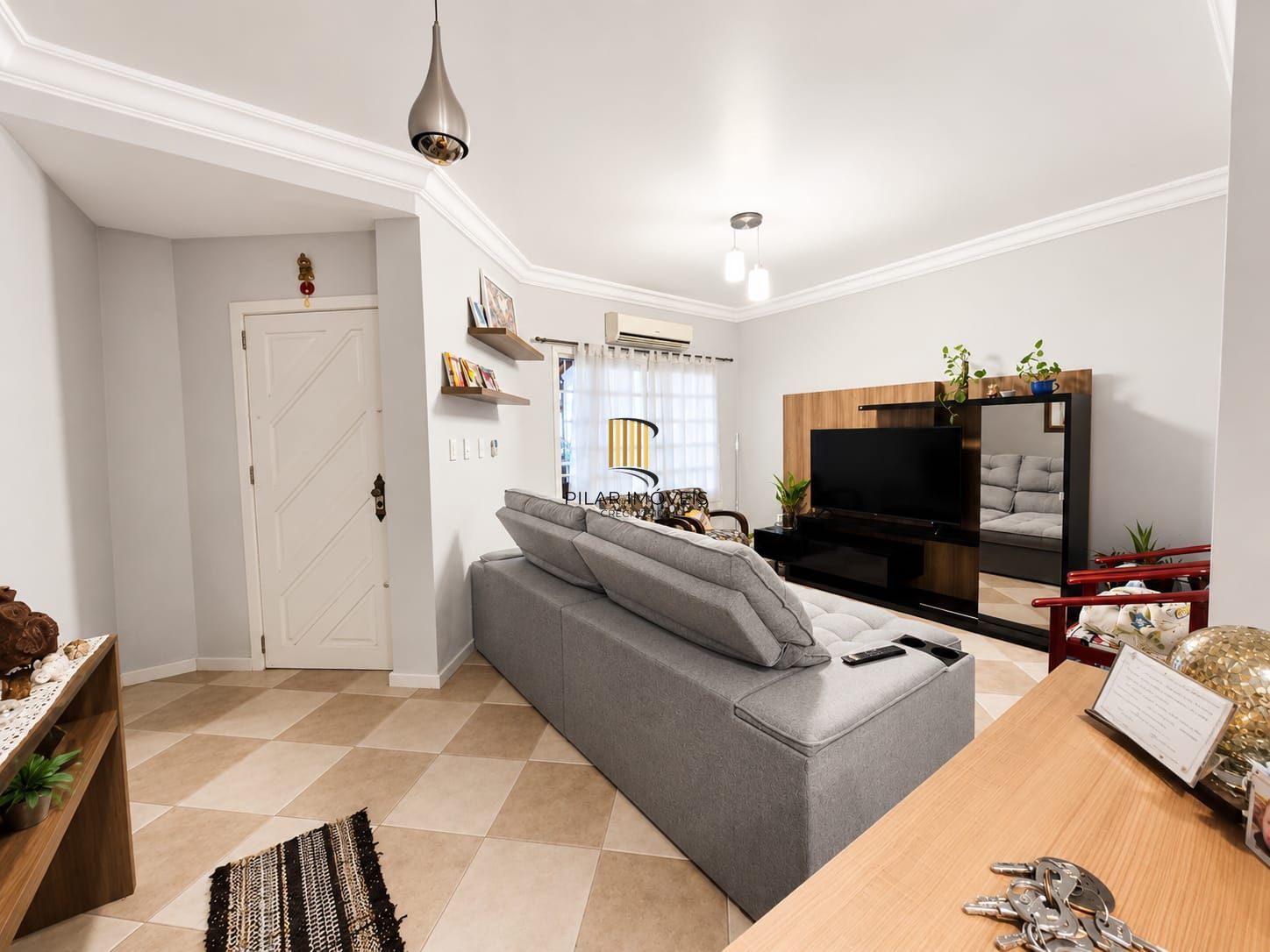 Casa 03 dormitórios no bairro Guarujá em Porto Alegre