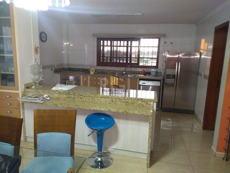 Casa 5 dormitórios no bairro Centro