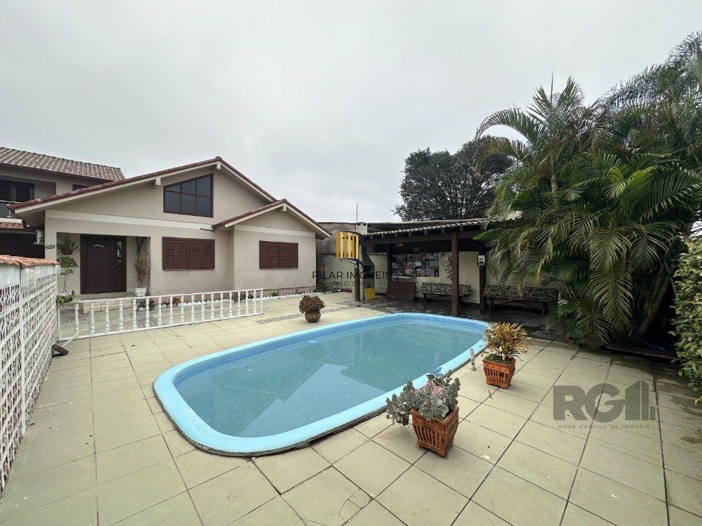 Casa 3 dormitórios no bairro Igara - Pilar Imóveis
