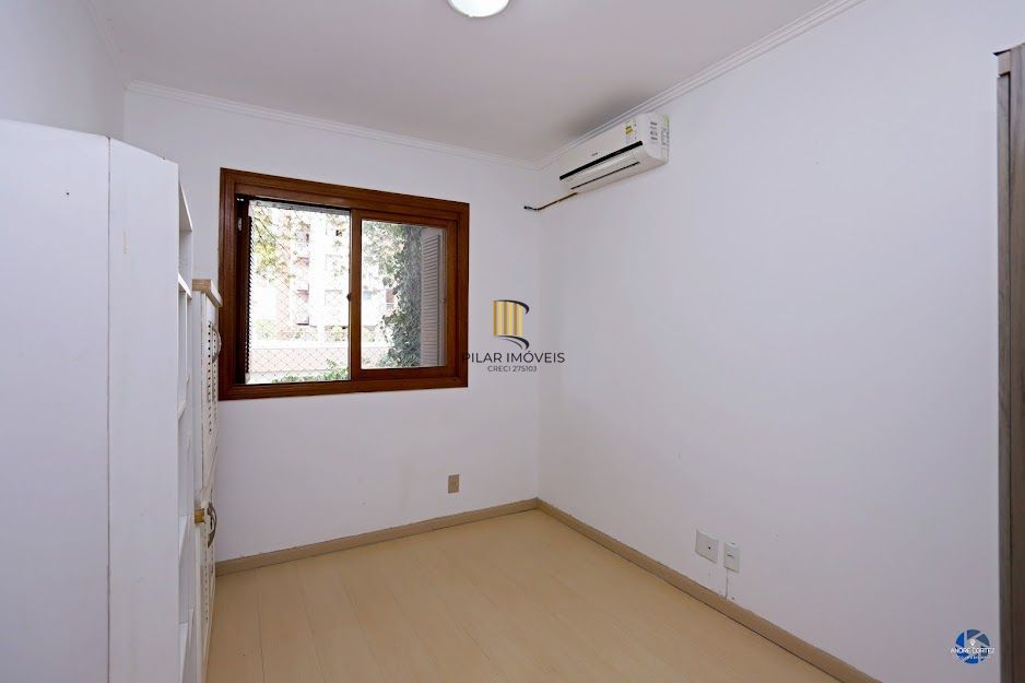 Apartamento semi mobiliado com churrasqueira e 02 garagens no Menino Deus em Porto Alegre