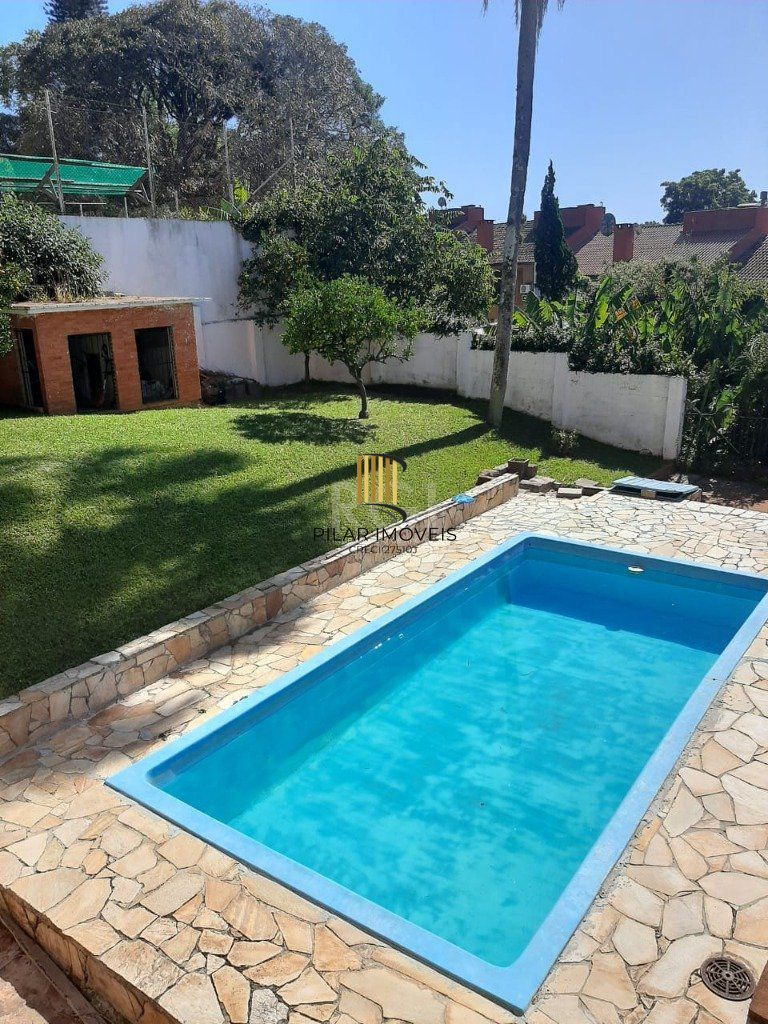 Casa 5 dormitórios no bairro Santa Tereza
