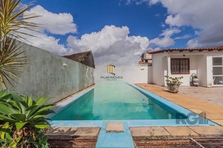 Casa 4 dormitórios no bairro Santo Antônio