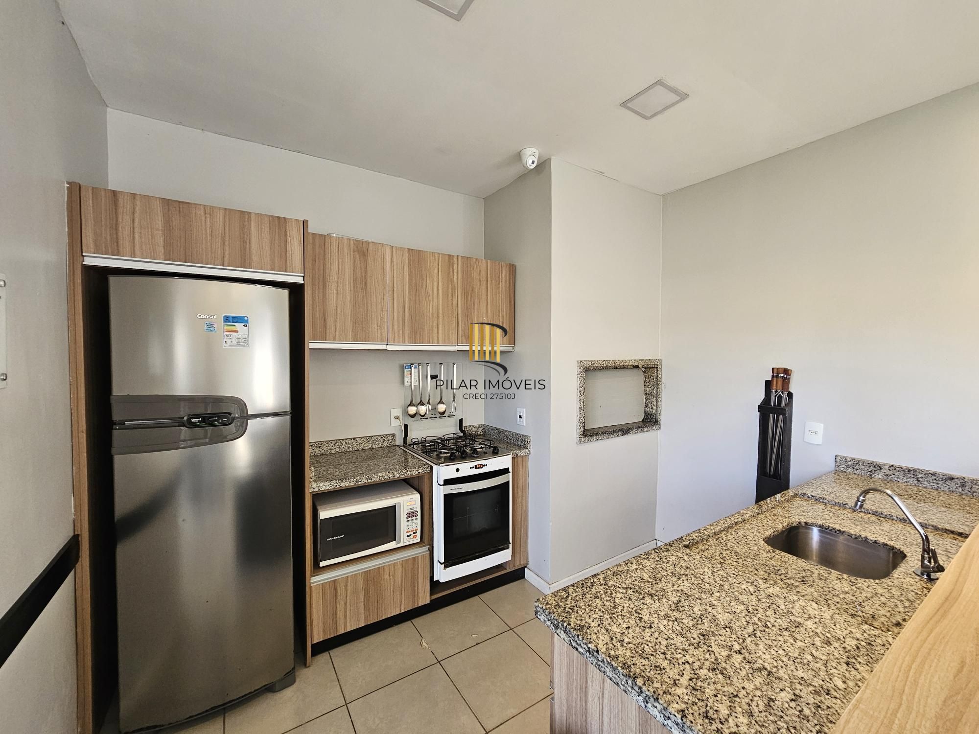 Apartamento 2 dormitórios com vaga e elevador perto da PUC