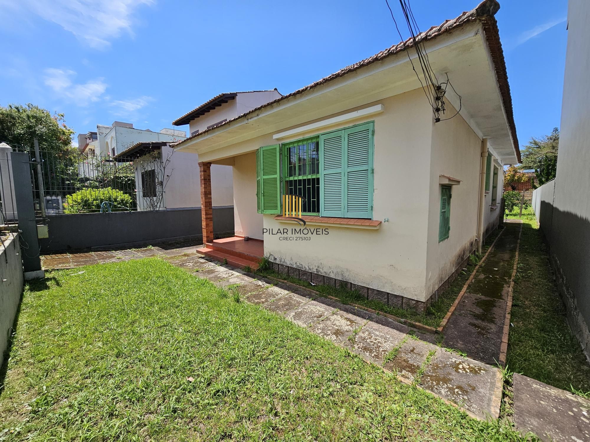 AMPLO TERRENO FRENTE NORTE NA MELHOR RUA DO BAIRRO TRISTEZA