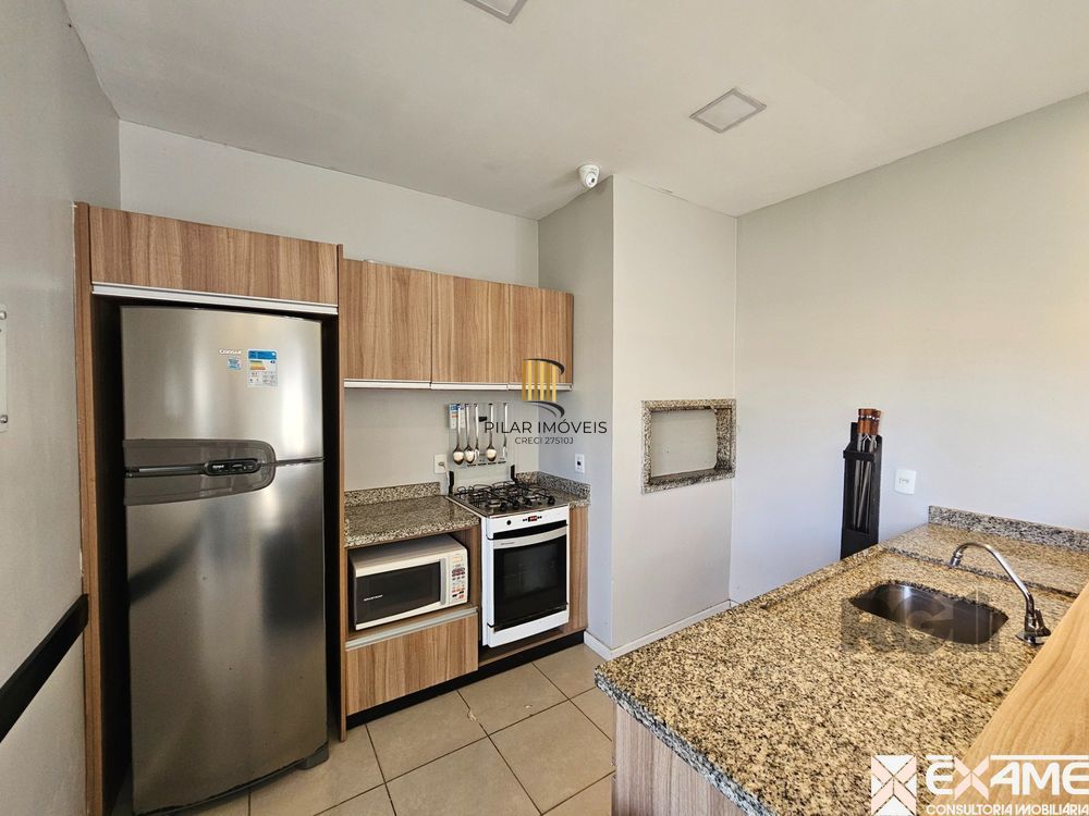 Apartamento 2 dormitórios com vaga e elevador perto da PUC