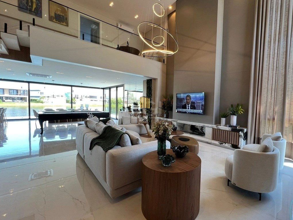 Excepcional sobrado 5 dormitórios com 5 suítes, totalmente mobiliado e ricamente decorado a beira lago em Xangrilá, no Condomínio Enseada.