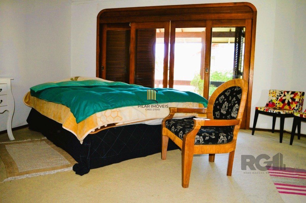 MAGNÍFICA MANSÃO ANOS 90 A BEIRA DO GUAÍBA NA ZONA SUL DE PORTO ALEGRE!