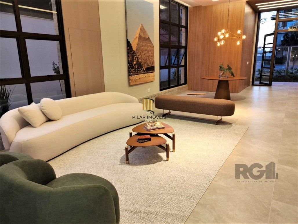 Lindo apartamento 2 dormitórios com 2 suítes, lavabo, vaga de garagem, amplo living 2 ambientes e cozinha com churrasqueira. - Pilar Imóveis