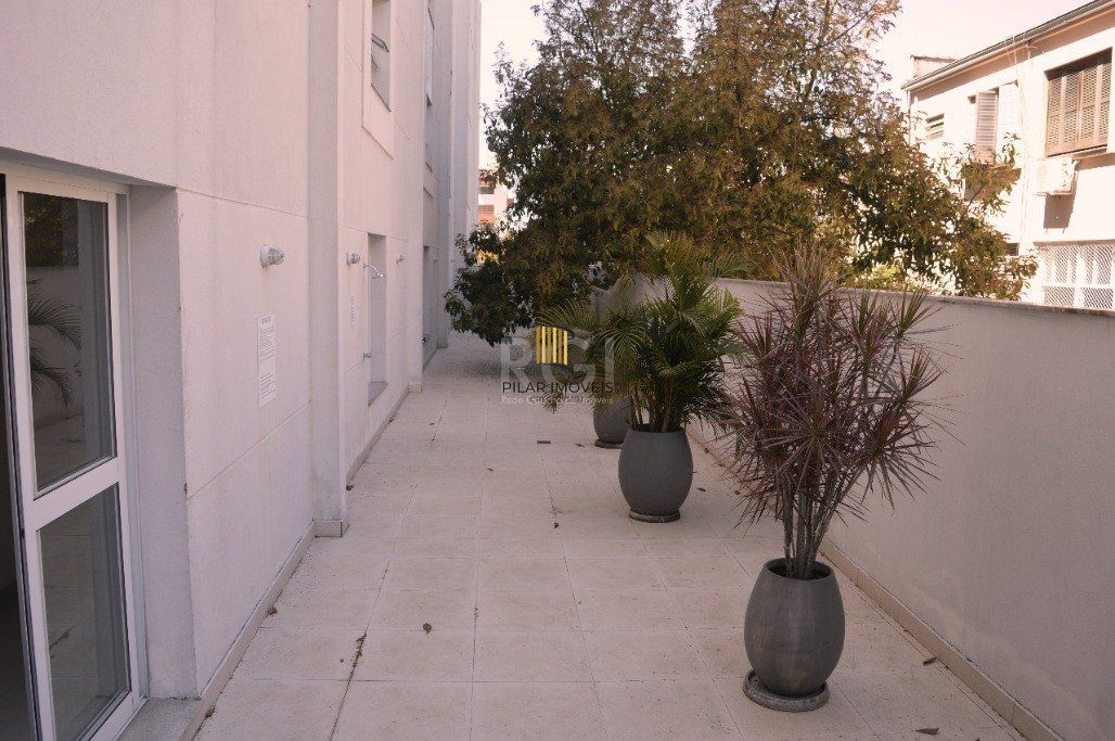 1 Dormitório c/garden, suíte, lavabo, churrasqueira e 1 Box, próximo ao Fórum.