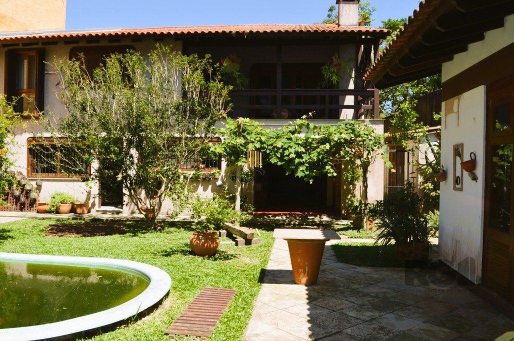 MAGNÍFICA MANSÃO ANOS 90 A BEIRA DO GUAÍBA NA ZONA SUL DE PORTO ALEGRE!